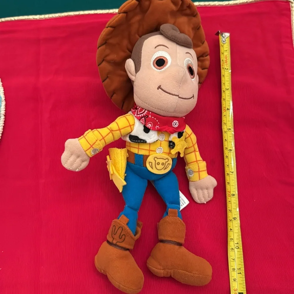 Woody Toy Story 11” red bandana, yellow sheriff’s star. Walt Disney World (OLCC)